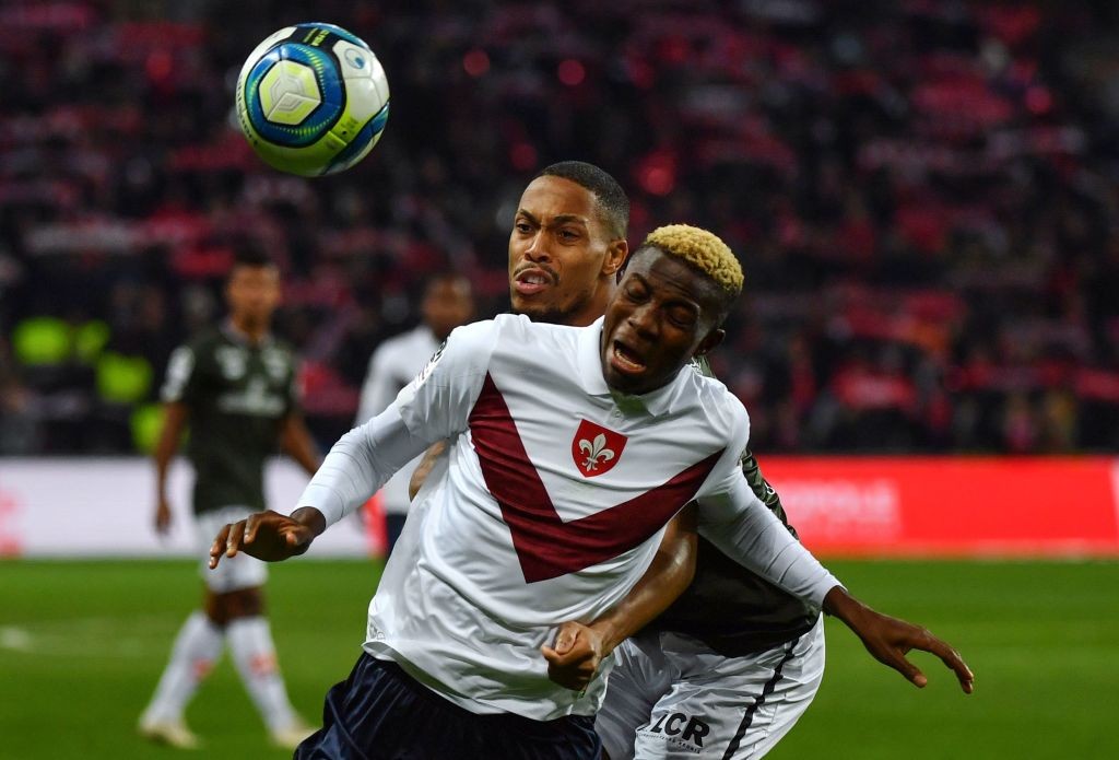 Lille forward Victor Osimhen (R) vies for the ball with Dijon's French defender Mickael Alphonse during the French L1 football match between Lille (LOSC) and Dijon (DFCO) at the Pierre-Mauroy Stadium in Villeneuve d'Ascq, near Lille, northern France, on November 30 2019. (Getty Images)