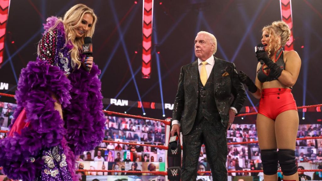 Charlotte Flair with Ric Flair and Lacey Evans on Monday Night RAW. (WWE)