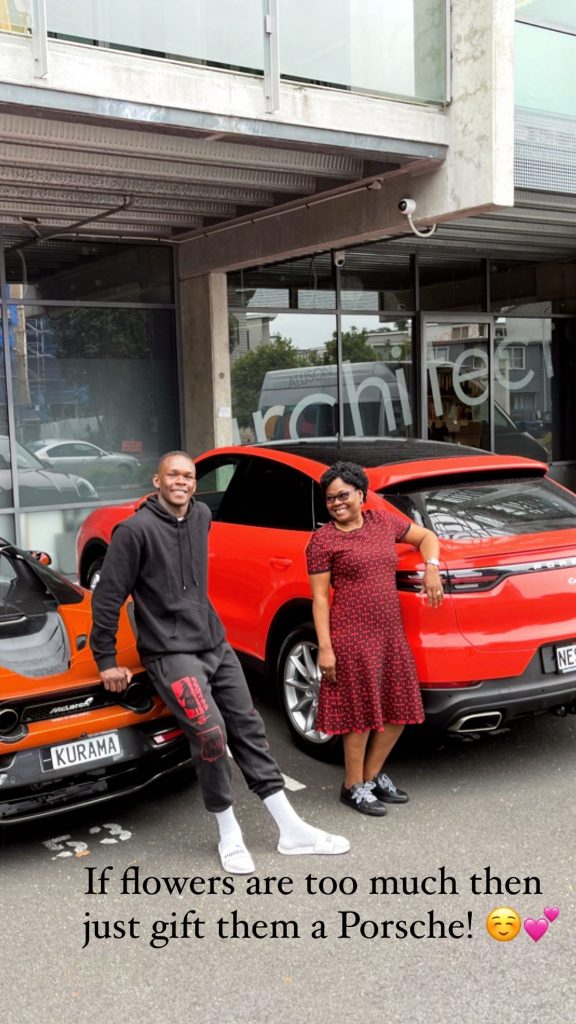 Israel Adesanya gifted a Red Porsche to his mother before gifting a new car to his dad earlier this week.