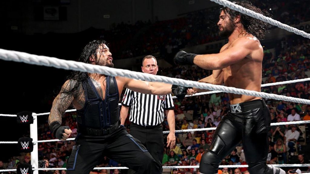 Roman Reigns and Seth Rollins inside the WWE ring as Rollins wants GQ Magazine cover shoot.