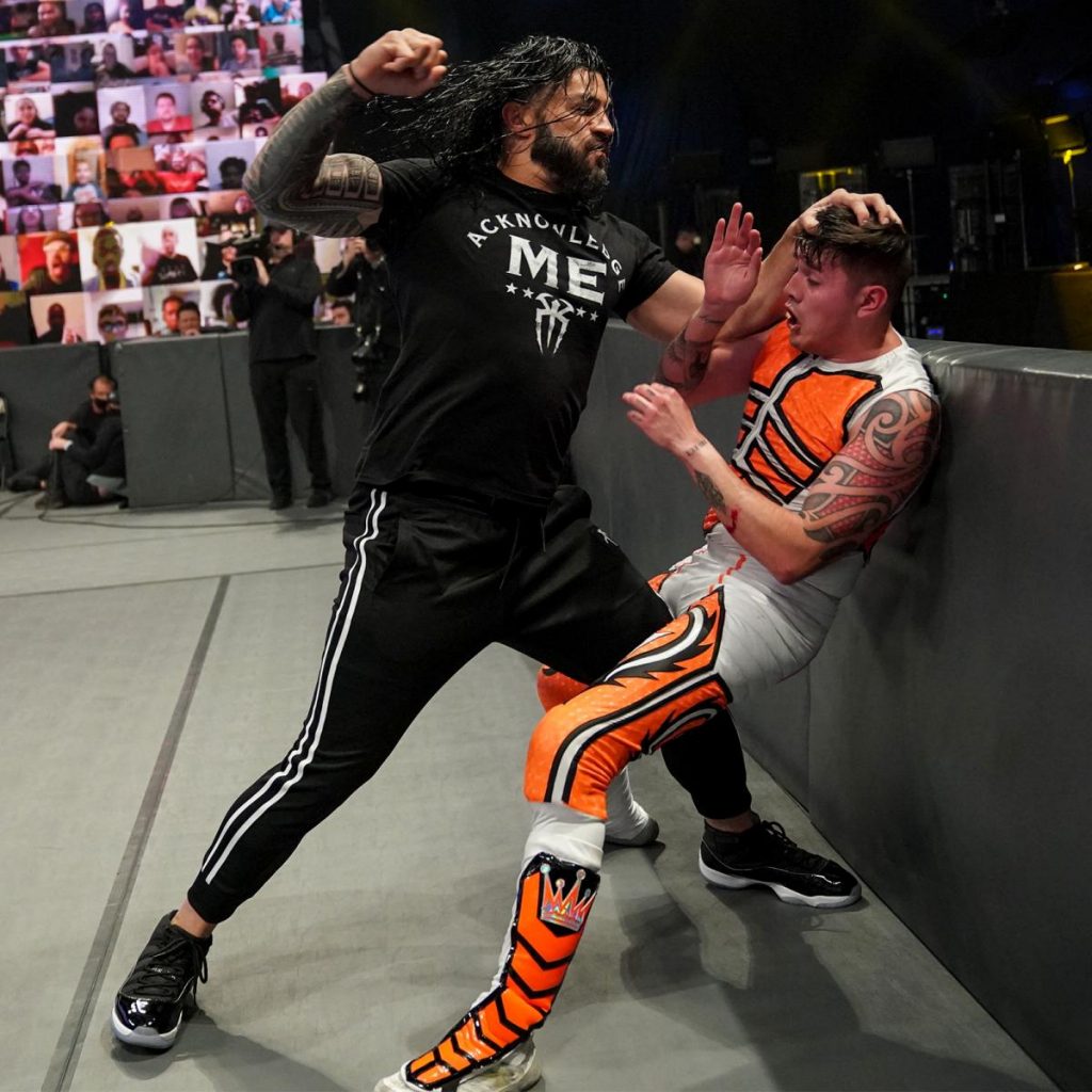 Roman Reigns attacks Dominik Mysterio on SmackDown