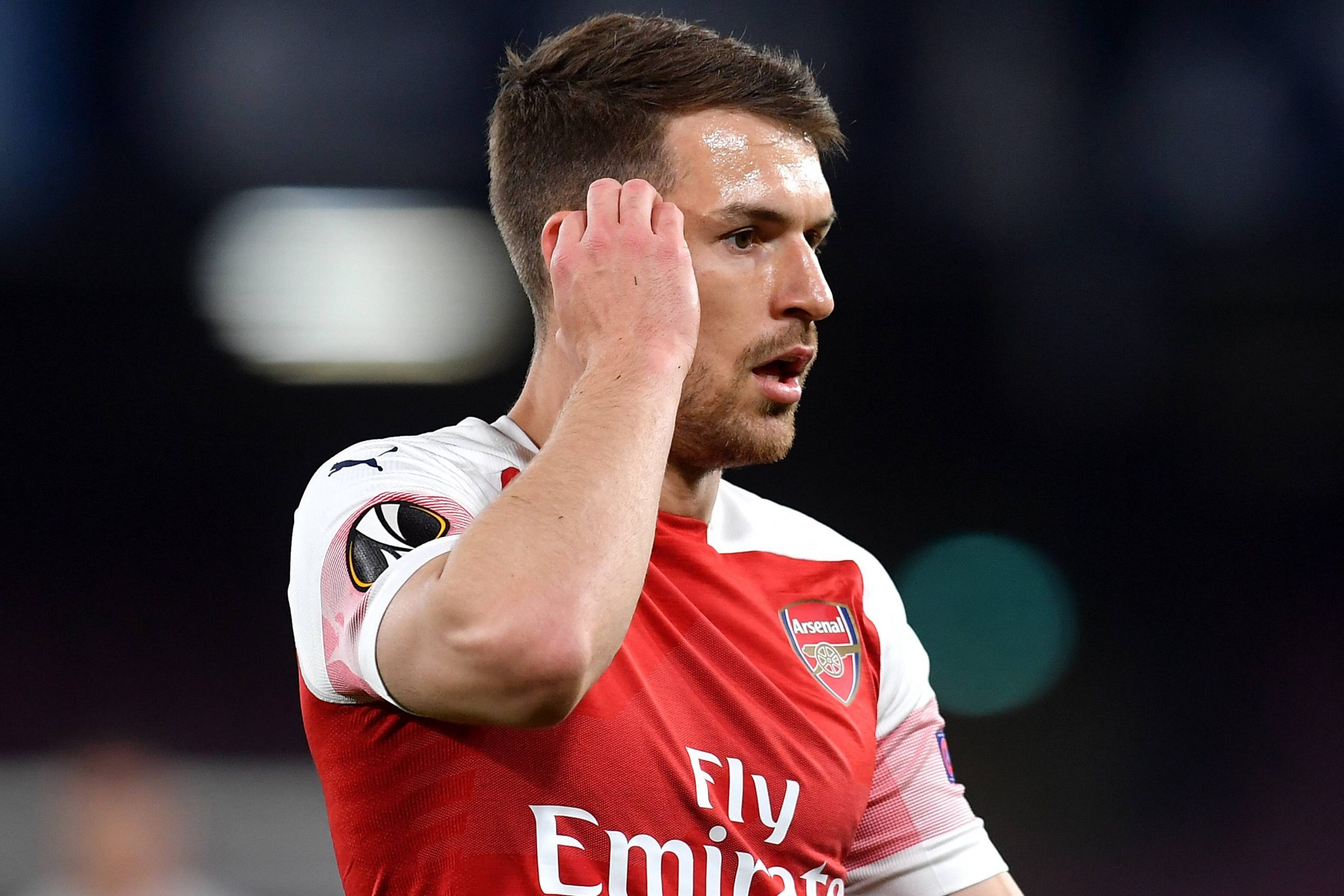 Aaron Ramsey of Arsenal reacts during a Europa League fixture.