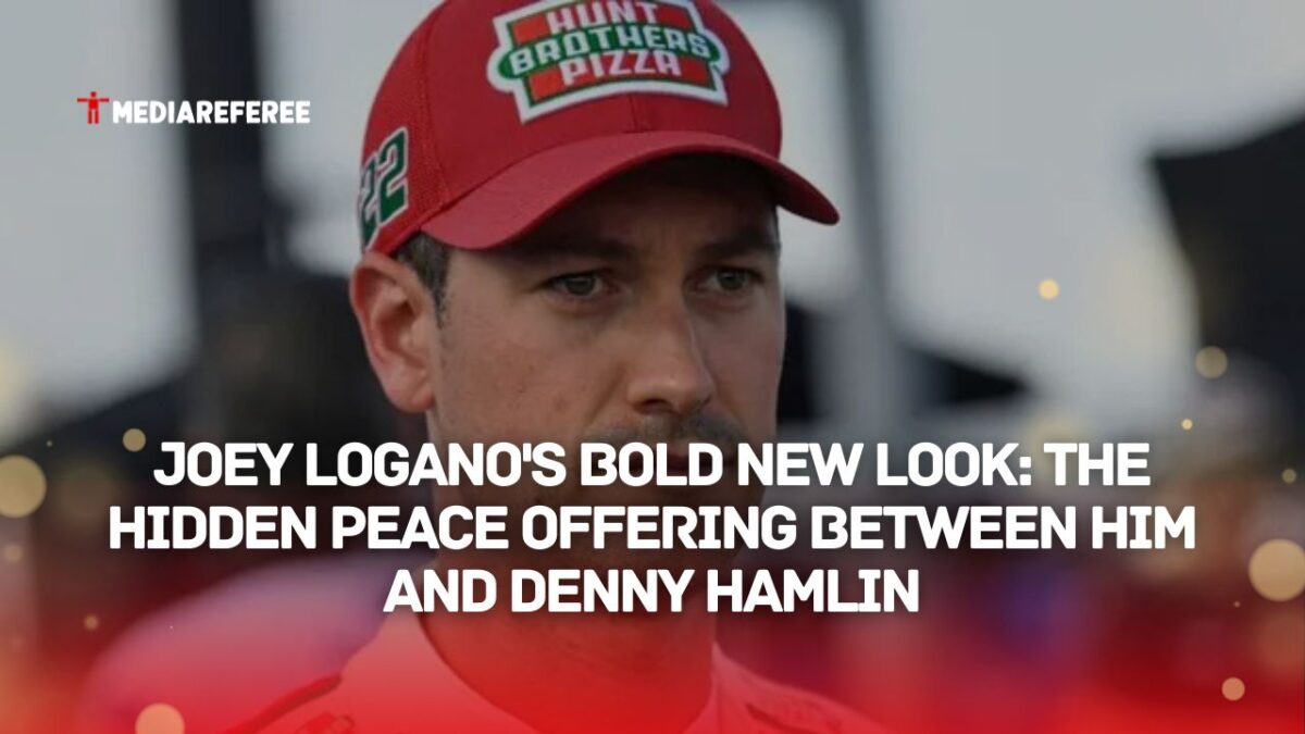 Joey Logano wearing a cap