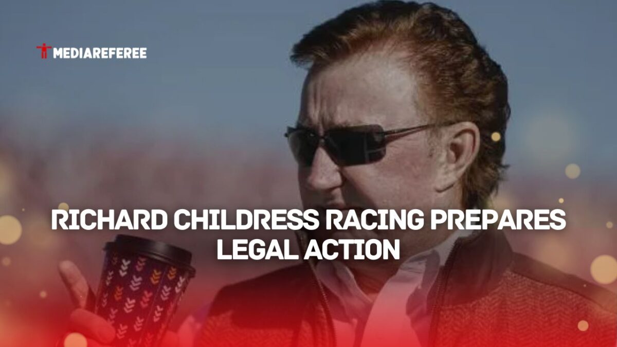 Richard Childress holding cup in his hand