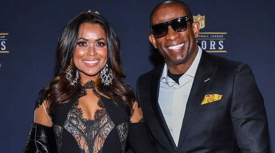 Deion Sanders with his girlfriend, Tracey Edmonds.