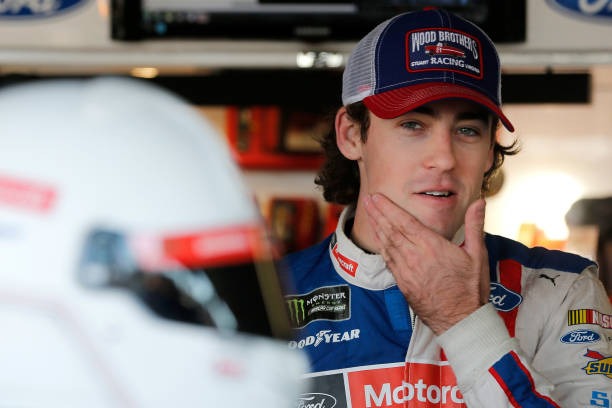 Ryan Blaney, driver of the #21 Motorcraft/Quick Lane Tire & Auto Center Ford, stands in the garage area during practice for the Monster Energy NASCAR Cup Series Apache Warrior 400 presented by Lucas Oil at Dover International Speedway on September 29, 2017 in Dover, Delaware. 