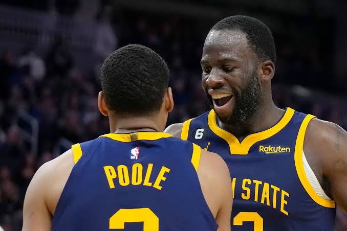 Jordan Poole and Draymond Green